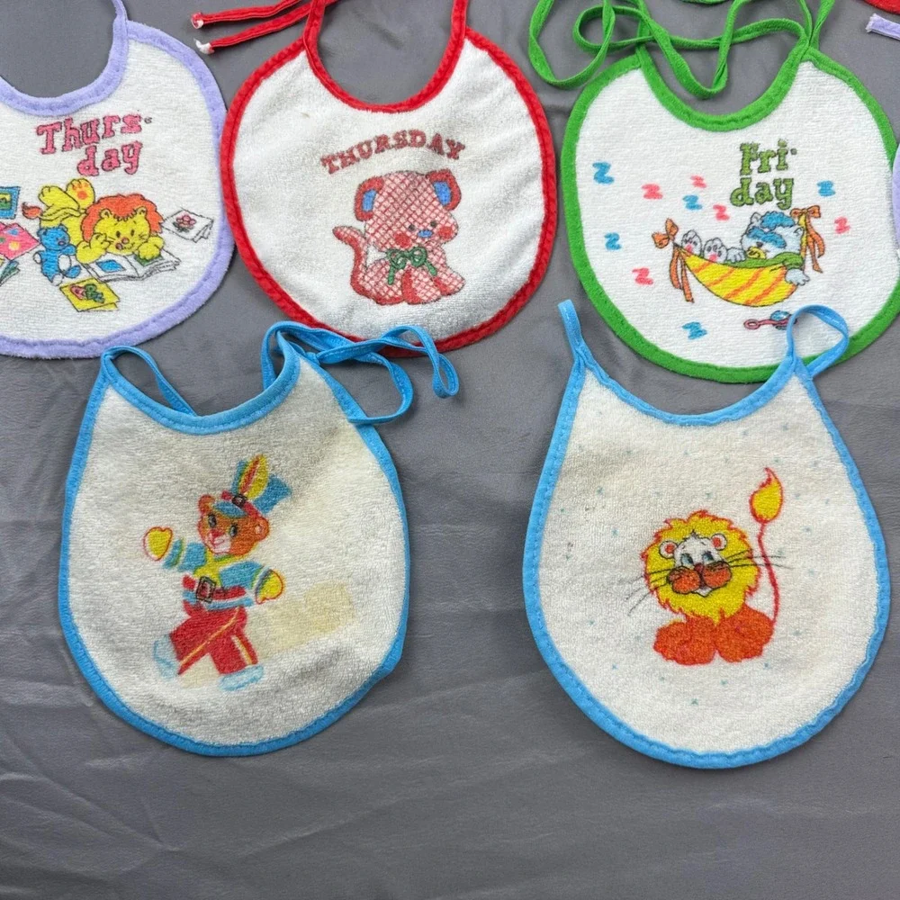 Vintage day of the week baby bibs. 10 total‎